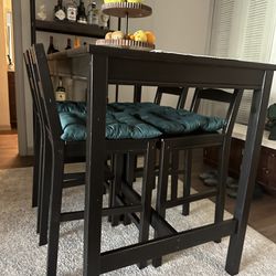 Ikea Dinning Table with four chair and pillows for chairs 