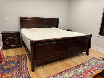 Wooden king size bed and 2 nightstands