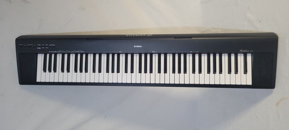 Yamaha Digital Portable Grand Piano / Keyboard 