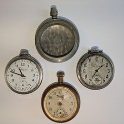 Collection of 4 antique pocket watch items as pictured. Late 1800s early 1900s. One is a partial case only, made of Silverode. All not working 
