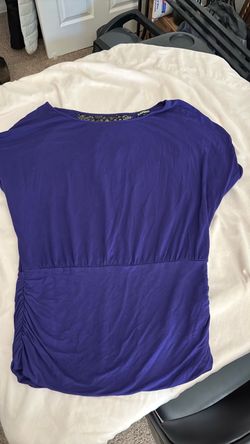 Purple with black lace on back. Medium. From Express. Great condition.