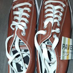 Model: Chuck Taylor All Star Ox (Low Top).

Colorway: Rugged Orange / White / Black.

Material: Textured leather upper rather than the classic canvas