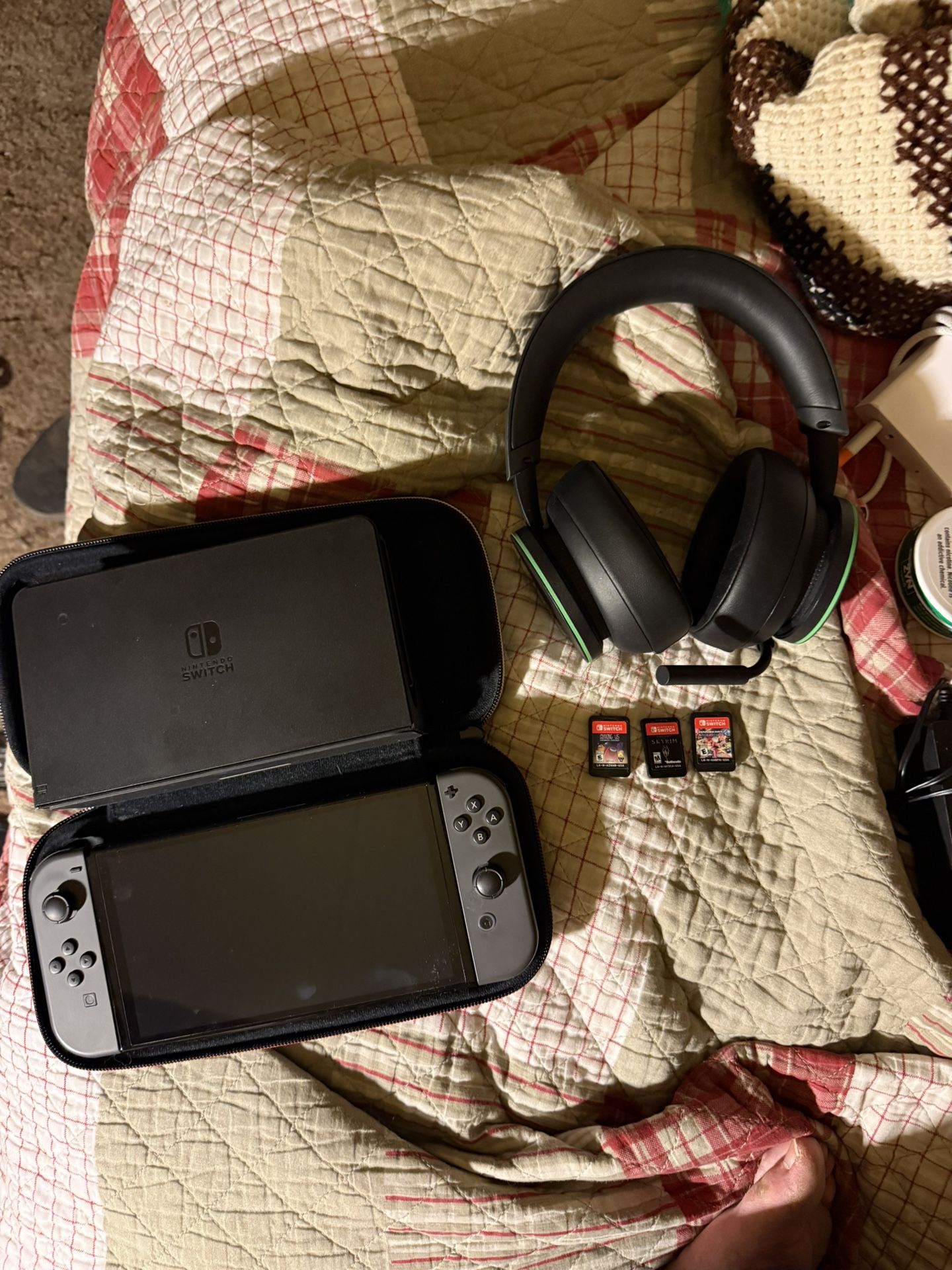 Nintendo switch oled with 3 games and gaming headphones
