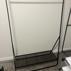 Metal Garment Rack. Black 65 pound capacity- like new!