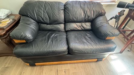 Black Leather Love Seat with Wood Trim