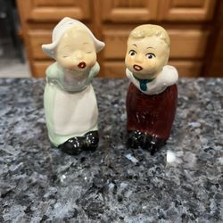 Vintage Japan Hand Painted Sweetheart kisses  pair of salt and pepper shakers.  Size approximately 3 1/2 inches tall.  Preowned with cork stoppers.  