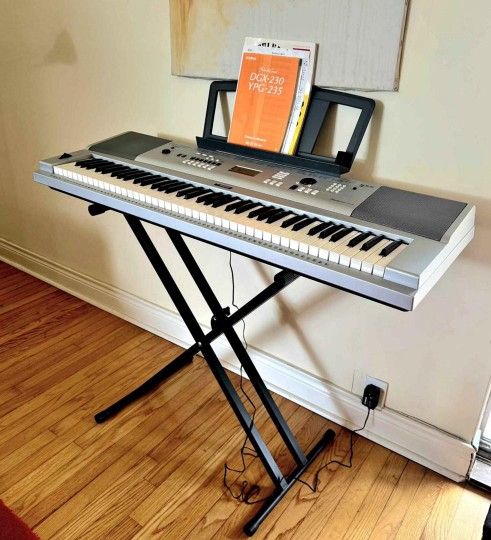 Yamaha-Portable-Grand-DGX-230 keyboard-With-stand
