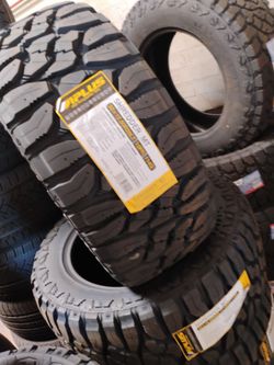New set of tires aplus mud terrain 33 1250 20 lt