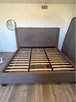 Eastern King upholstery bed frame (only)
