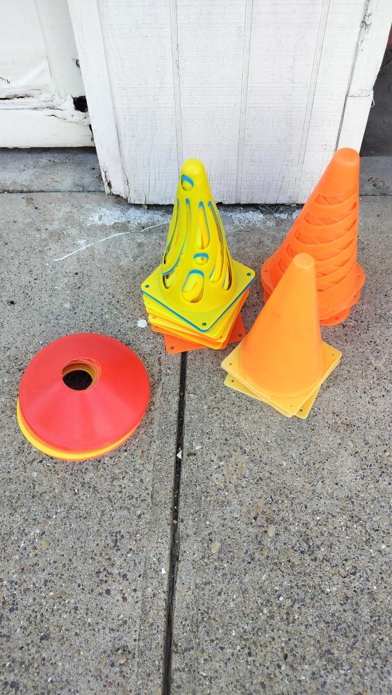 Cones, sticks, pennies and clipboard for athletic training