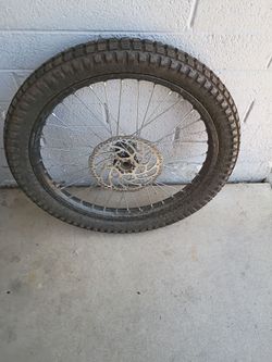 New dirt bike / motorcycle tire and wheel 2.75-19 no offers no trade 75th Ave Indian School $20 cash serious buyers only please