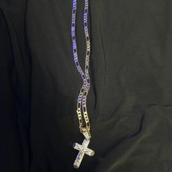 14 k gold chain with a cross pendant
