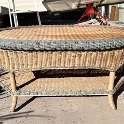 Vintage Wicker two toned oval coffee table with lower shelf. Natural and greenish blue color