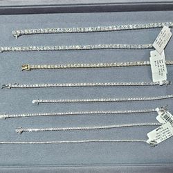 Fourteen carat gold, one point three carrot diamond, seven inch bracelets starting at 1100