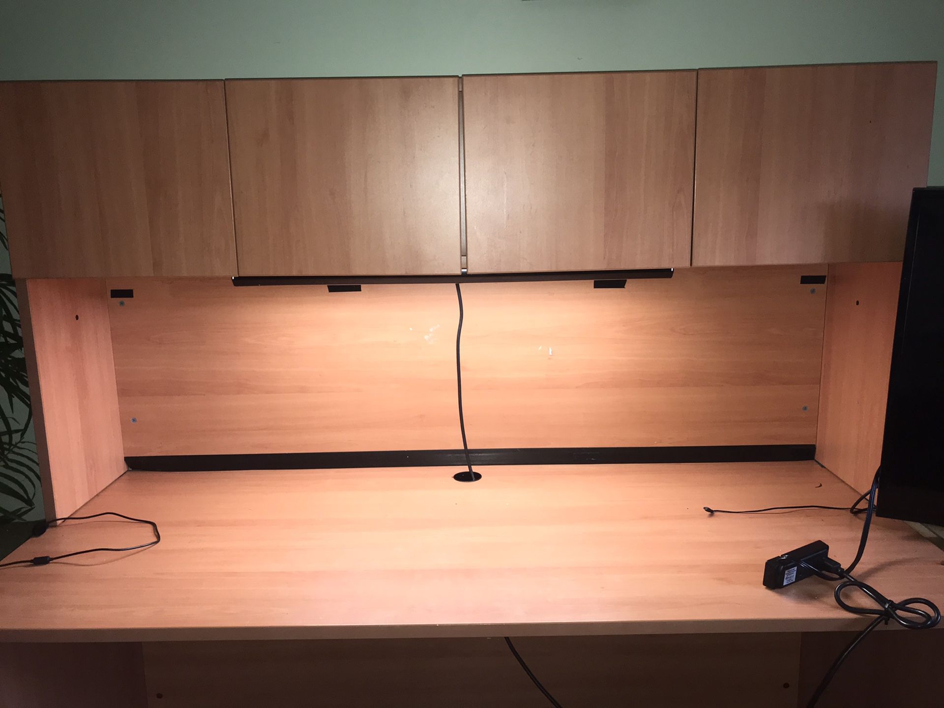 large desk with bulit in lamp