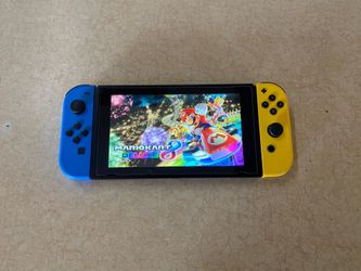 Nintendo Switch V2 with 120 Switch Games + 7500 Classic Games