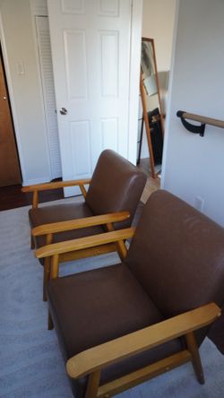 Pair of brown arm chairs