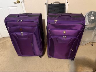 Large purple rolling luggage