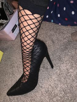 Black fishnet stilettos