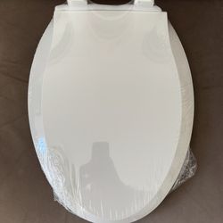 Elongated Toilet Seat + Built in toddler seat