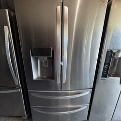 LG 4 Door  Stainless Steel Refrigerator 36 Inch Wide Works Great 