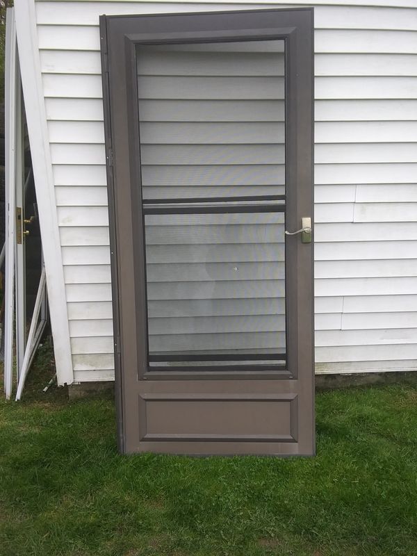 36'' used brown storm door. In ok shape. 25 obo for Sale in Anderson