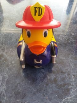 Munchkin Brand rubber firefighter bubble ducky bathtub faucet cover (in LOS LUNAS)