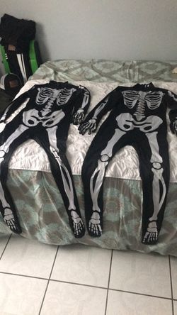 2 child Skeleton costumes Size L
