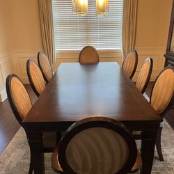 9 piece wooden dining table with chairs