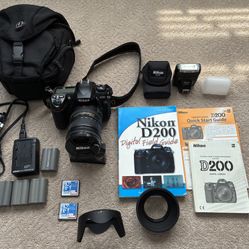 Nikon D200  18-200 mm Lens w/onboard & Separate Attachable Flash.
