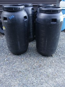 55 gallon plastic barrels (black)
