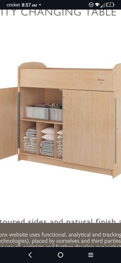 Changing Table With The Storage Lock  With A Crib 