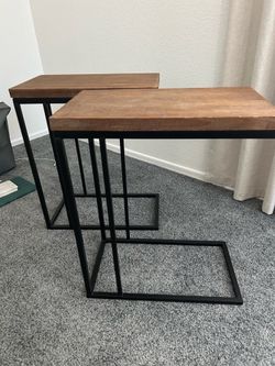 Black and brown side tables