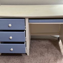 Desk with drawers and chair