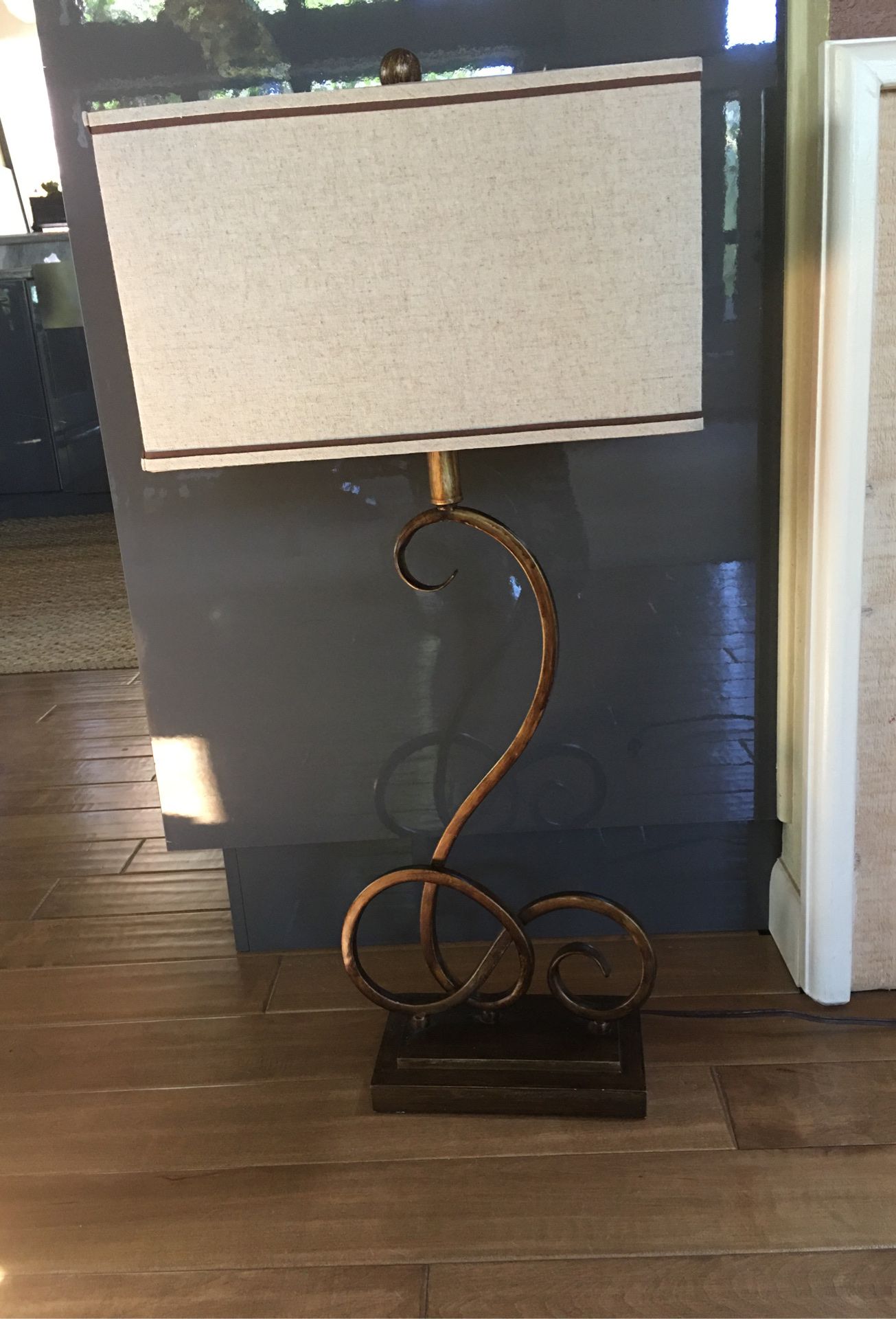 Modern metal table lamp. 31” tall.