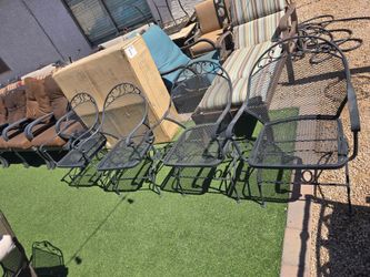 $200 IRON 4 ROCKING CHAIRS