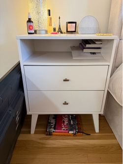 white nightstand with drawers