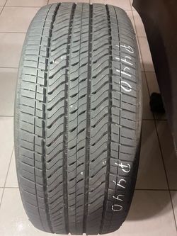 275/50/22. One used Bridgestone tire please read description good/great tread.