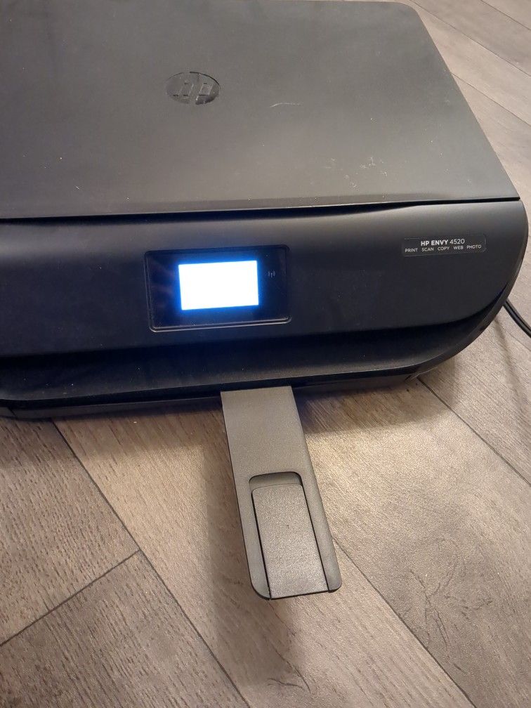 Printer HP Envy 4520 with spare HP 63xl ink cartridge