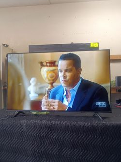 55 inch Android 4k smart tv beautiful tv comes with remote control shows great quality clear picture works perfect guaranteed