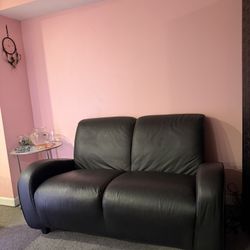 Black leather small couch 