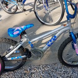Four Kids Bikes And Six Adult Bikes