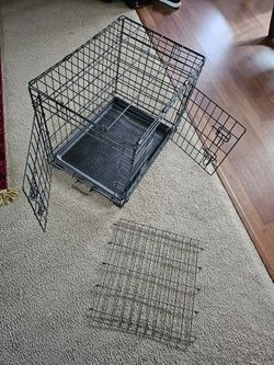 large pet cage 2 doors & divider working great 
L 24" X W 18"X H 20"