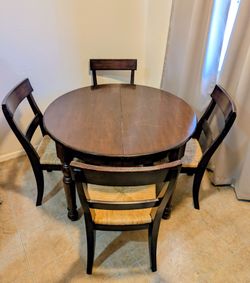 Round Solid wood table and 4 chairs!!