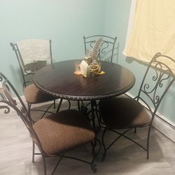 Wooden Table and 4 Material Cushioned Chairs