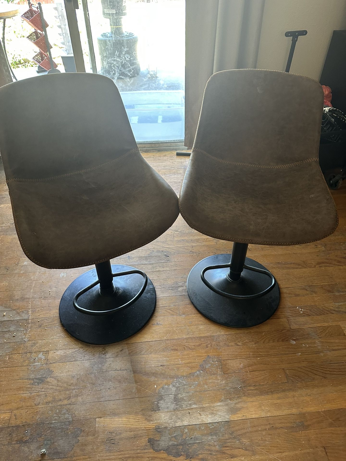 Leather Bar Stools Move Up And Down.