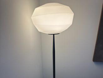 Modern floor lamp with glass globe