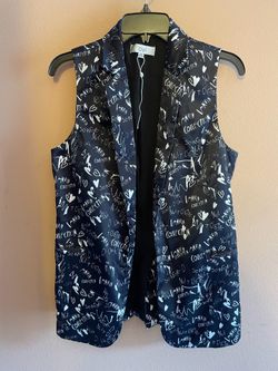gilet (vest) featuring an all-over white graffiti scribble print