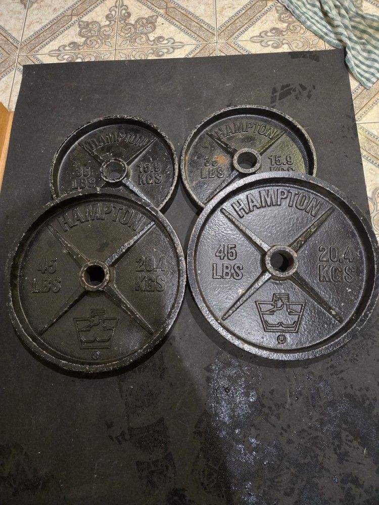 Used 35lb And 45lb Deep Dish Olympic Weight Plates