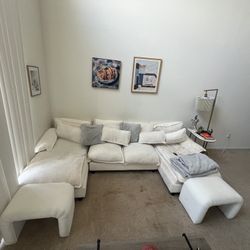 White Couch with Ottomans and Pillows